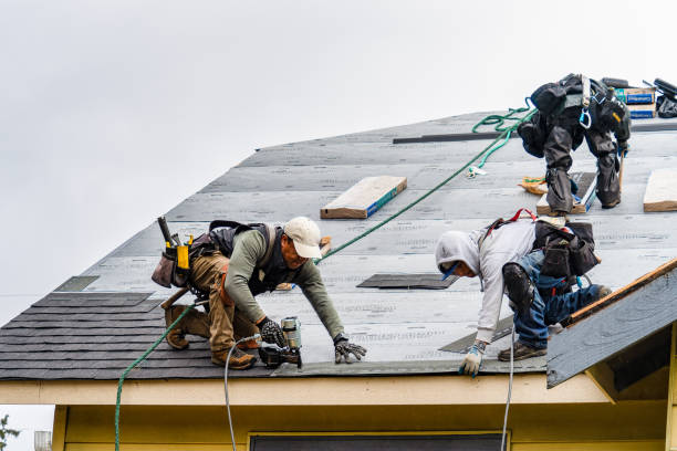 Professional Roofing technician working in West Des Moines, IA